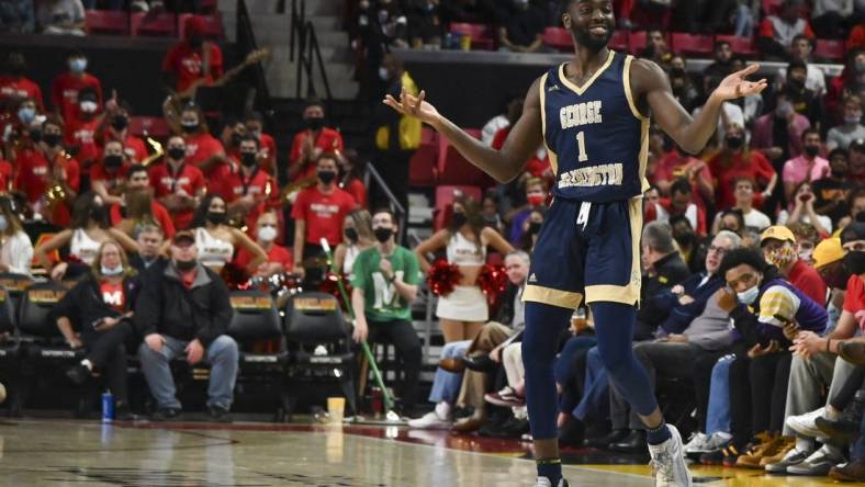 Nov 11, 2021; College Park, Maryland, USA;  George Washington Colonials guard Joe Bamisile (1) reacts to spectators during the game against the Maryland Terrapins at Xfinity Center. Mandatory Credit: Tommy Gilligan-USA TODAY Sports