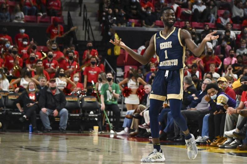 Nov 11, 2021; College Park, Maryland, USA;  George Washington Colonials guard Joe Bamisile (1) reacts to spectators during the game against the Maryland Terrapins at Xfinity Center. Mandatory Credit: Tommy Gilligan-USA TODAY Sports