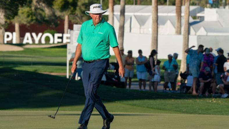 Nov 13, 2021; Phoenix, Arizona, USA; Kirk Triplett lines up a putt on the 18th hole during the third round of the Charles Schwab Cup Championship golf tournament at Phoenix Country Club. Mandatory Credit: Allan Henry-USA TODAY Sports