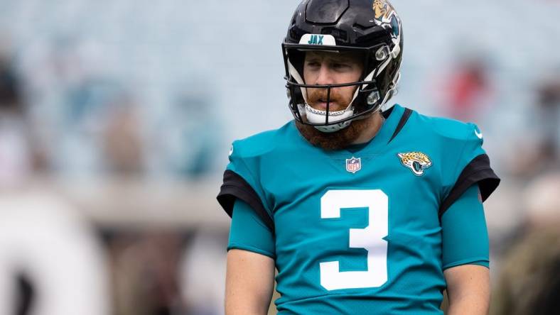 Nov 28, 2021; Jacksonville, Florida, USA; Jacksonville Jaguars quarterback C.J. Beathard (3) warms up before the game against the Atlanta Falcons at TIAA Bank Field. Mandatory Credit: Matt Pendleton-USA TODAY Sports