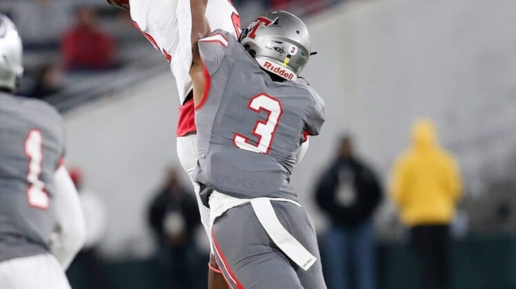 Thompson defensive back Tony Mitchell (3) breaks up a pass intended for Central wide receiver Karmello English (2) during the 7A state championship game in Birmingham Wednesday, Dec. 1, 2021. [Staff Photo/Gary Cosby Jr]7a Championship Central Vs Thompson
