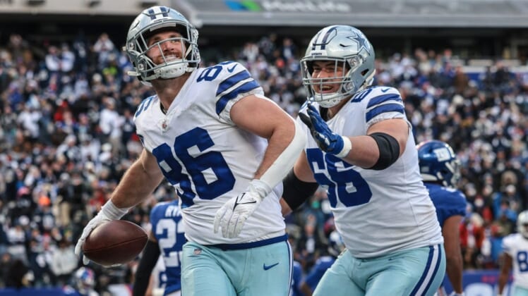 Dec 19, 2021; East Rutherford, New Jersey, USA; Dallas Cowboys tight end Dalton Schultz (86) celebrates his touchdown reception with guard Connor McGovern (66) during the second half against the New York Giants at MetLife Stadium. Mandatory Credit: Vincent Carchietta-USA TODAY Sports