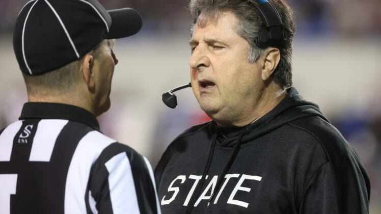 Mississippi State Bulldogs Head Coach Mike Leach talks to the referee after a turnover by his team to the Texas Tech Red Raiders during the AutoZone Liberty Bowl at Liberty Bowl Memorial Stadium on Tuesday, Dec. 28, 2021.Jrca6433