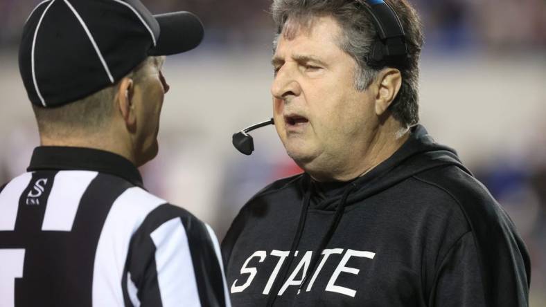 Mississippi State Bulldogs Head Coach Mike Leach talks to the referee after a turnover by his team to the Texas Tech Red Raiders during the AutoZone Liberty Bowl at Liberty Bowl Memorial Stadium on Tuesday, Dec. 28, 2021.

Jrca6433