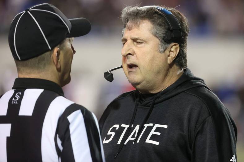 Mississippi State Bulldogs Head Coach Mike Leach talks to the referee after a turnover by his team to the Texas Tech Red Raiders during the AutoZone Liberty Bowl at Liberty Bowl Memorial Stadium on Tuesday, Dec. 28, 2021.

Jrca6433