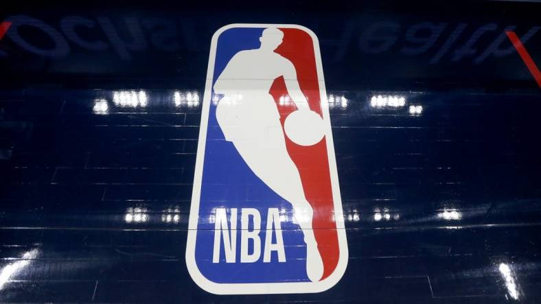 Jan 6, 2022; New Orleans, Louisiana, USA; The NBA logo on the floor before the game between the New Orleans Pelicans and the Golden State Warriors at the Smoothie King Center. Mandatory Credit: Chuck Cook-USA TODAY Sports