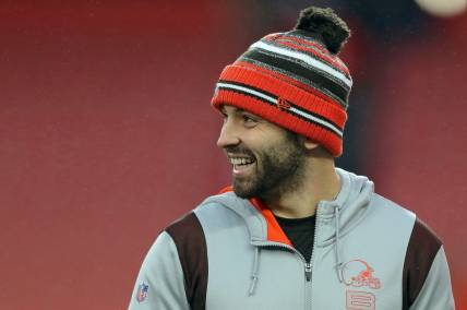 Browns quarterback Baker Mayfield laughs as he watches his teammates warm up before a game against the Cincinnati Bengals, Sunday, Jan. 9, 2022, in Cleveland.

Baker Pregame 2