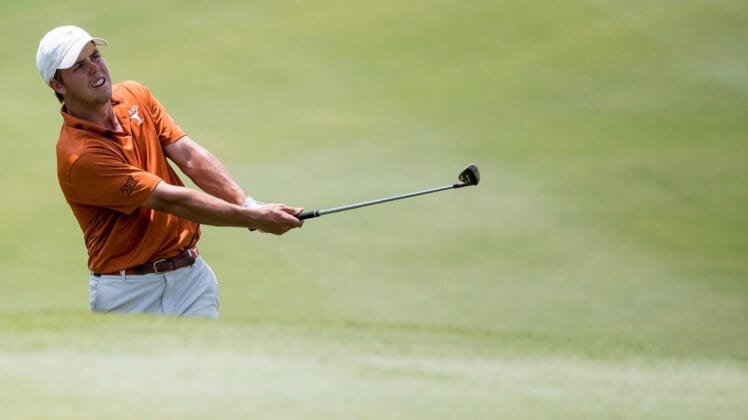 Pierceson Coody plays the ball at the 18th hole at the NCAA Austin Regional golf tournament at the University of Texas Golf Club on Wednesday, May 15, 2019.Rbb Ncaa Golf