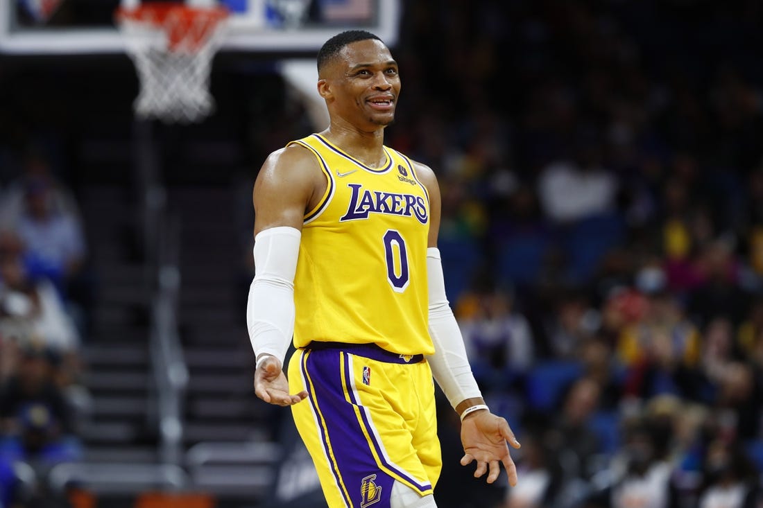 Jan 21, 2022; Orlando, Florida, USA; Los Angeles Lakers guard Russell Westbrook (0) smiles against the Orlando Magic during the second quarter at Amway Center. Mandatory Credit: Kim Klement-USA TODAY Sports