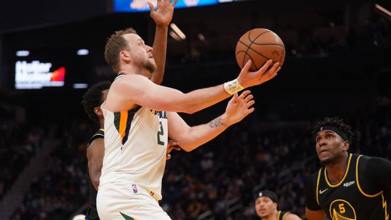 Jan 23, 2022; San Francisco, California, USA; Utah Jazz forward Joe Ingles (2) drives to the hoop against the Golden State Warriors in the fourth quarter at the Chase Center. Mandatory Credit: Cary Edmondson-USA TODAY Sports