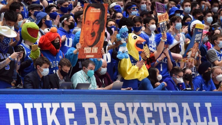 Jan 25, 2022; Durham, North Carolina, USA; Duke Blue Devils fans hold up signs during the first half against the Clemson Tigers at Cameron Indoor Stadium. Mandatory Credit: Rob Kinnan-USA TODAY Sports
