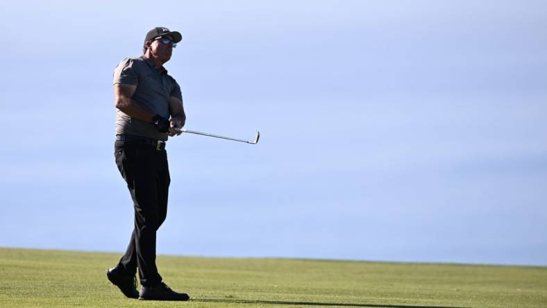 Jan 27, 2022; San Diego, California, USA; Phil Mickelson plays his second shot on the fourth hole during the first round of the Farmers Insurance Open golf tournament at Torrey Pines Municipal Golf Course - South Course. Mandatory Credit: Orlando Ramirez-USA TODAY Sports