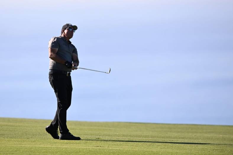Jan 27, 2022; San Diego, California, USA; Phil Mickelson plays his second shot on the fourth hole during the first round of the Farmers Insurance Open golf tournament at Torrey Pines Municipal Golf Course - South Course. Mandatory Credit: Orlando Ramirez-USA TODAY Sports