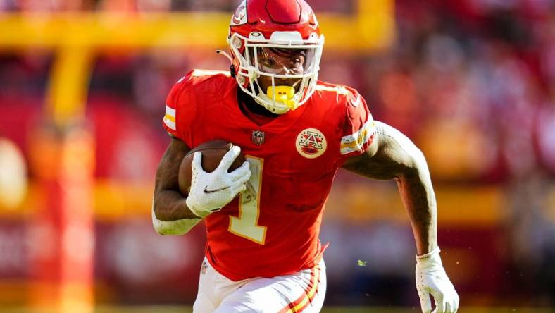 Jan 30, 2022; Kansas City, Missouri, USA; Kansas City Chiefs running back Jerick McKinnon (1) runs the ball during the first half of the AFC Championship game against the Cincinnati Bengals at GEHA Field at Arrowhead Stadium. Mandatory Credit: Jay Biggerstaff-USA TODAY Sports