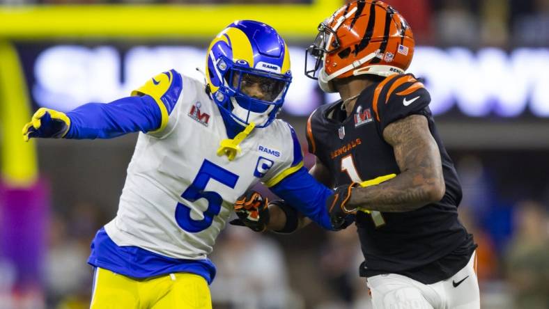 Feb 13, 2022; Inglewood, CA, USA; Los Angeles Rams cornerback Jalen Ramsey (5) defends against Cincinnati Bengals wide receiver Ja'Marr Chase (1) during Super Bowl LVI at SoFi Stadium. Mandatory Credit: Mark J. Rebilas-USA TODAY Sports