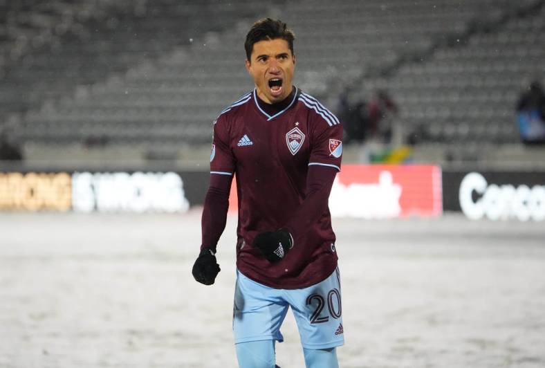 Feb 23, 2022; Commerce City, CO, USA; Colorado Rapids midfielder Nicolas Mezquida (20) celebrates his penalty kick shootout goal against the Comunicacionese FC at Dick's Sporting Goods Park. Mandatory Credit: Ron Chenoy-USA TODAY Sports