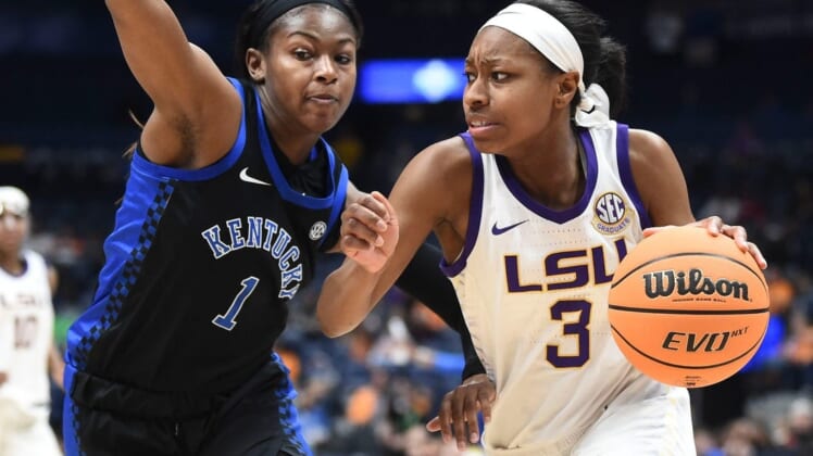LSU guard Khayla Pointer (3) tries to get to the basket while guarded by Kentucky guard Robyn Benton (1) during the SEC Women's Basketball Tournament game in Nashville, Tenn. on Friday, March 4, 2022.Sec Tourney Lsu Ky