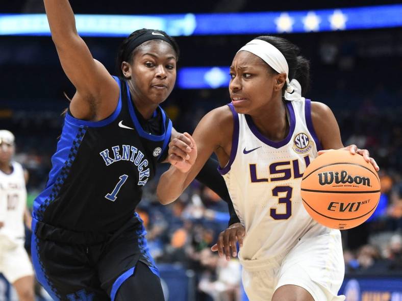 LSU guard Khayla Pointer (3) tries to get to the basket while guarded by Kentucky guard Robyn Benton (1) during the SEC Women's Basketball Tournament game in Nashville, Tenn. on Friday, March 4, 2022.

Sec Tourney Lsu Ky