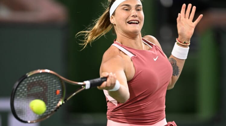 Mar 8, 2022; Indian Wells, CA, USA;  Aryna Sabalenka participates in the Eisenhower Cup, a charity event using the the Tie Break Tens format  at the BNP Paribas Open at Indian Wells Tennis Garden. Mandatory Credit: Jayne Kamin-Oncea-USA TODAY Sports