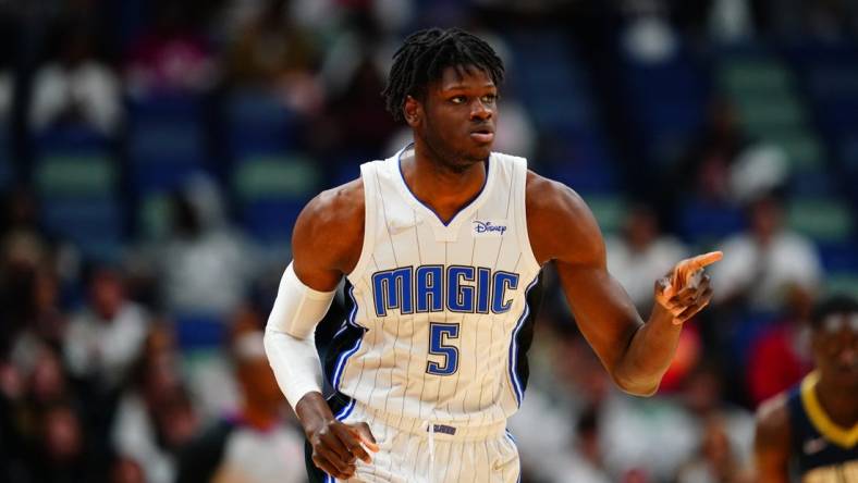 Mar 9, 2022; New Orleans, Louisiana, USA; Orlando Magic center Mo Bamba (5) reacts to a play against the New Orleans Pelicans during the first quarter at Smoothie King Center. Mandatory Credit: Andrew Wevers-USA TODAY Sports