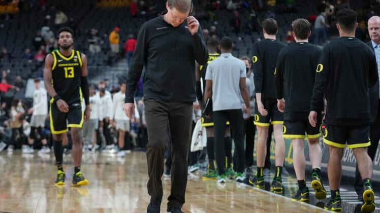Mar 10, 2022; Las Vegas, NV, USA; Oregon Ducks head coach Dana Altman walks off the court after the Ducks were defeated by the Colorado Buffaloes 80-69 at T-Mobile Arena. Mandatory Credit: Stephen R. Sylvanie-USA TODAY Sports