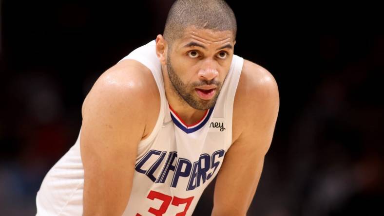 Mar 11, 2022; Atlanta, Georgia, USA; LA Clippers forward Nicolas Batum (33) reacts to a play during their game against the Atlanta Hawks at State Farm Arena. Mandatory Credit: Jason Getz-USA TODAY Sports