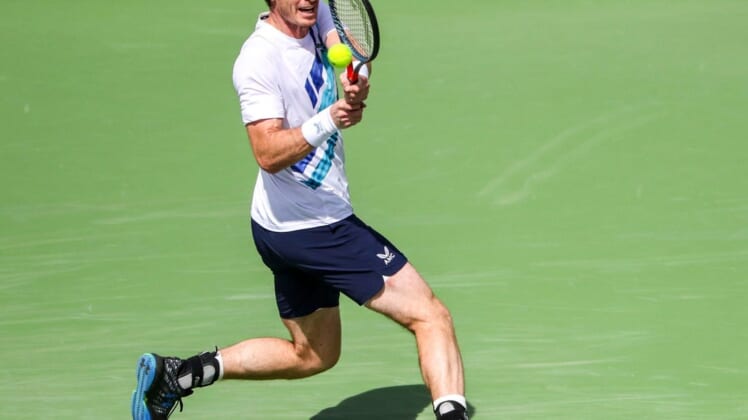 Andy Murray of Great Britain returns to Alexander Bublik of Kazakhstan during round two of the BNP Paribas Open at the Indian Wells Tennis Garden in Indian Wells, Calif., Sunday, March 13, 2022.