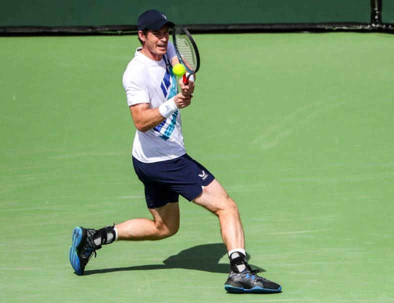 Andy Murray of Great Britain returns to Alexander Bublik of Kazakhstan during round two of the BNP Paribas Open at the Indian Wells Tennis Garden in Indian Wells, Calif., Sunday, March 13, 2022.