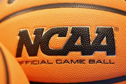 Mar 14, 2022; Dayton, OH, USA; General view of the NCAA logo on a basket ball during practice the day before the start of the First Four of the 2022 NCAA Tournament at UD Arena. Mandatory Credit: Rick Osentoski-USA TODAY Sports