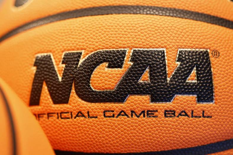 Mar 14, 2022; Dayton, OH, USA; General view of the NCAA logo on a basket ball during practice the day before the start of the First Four of the 2022 NCAA Tournament at UD Arena. Mandatory Credit: Rick Osentoski-USA TODAY Sports