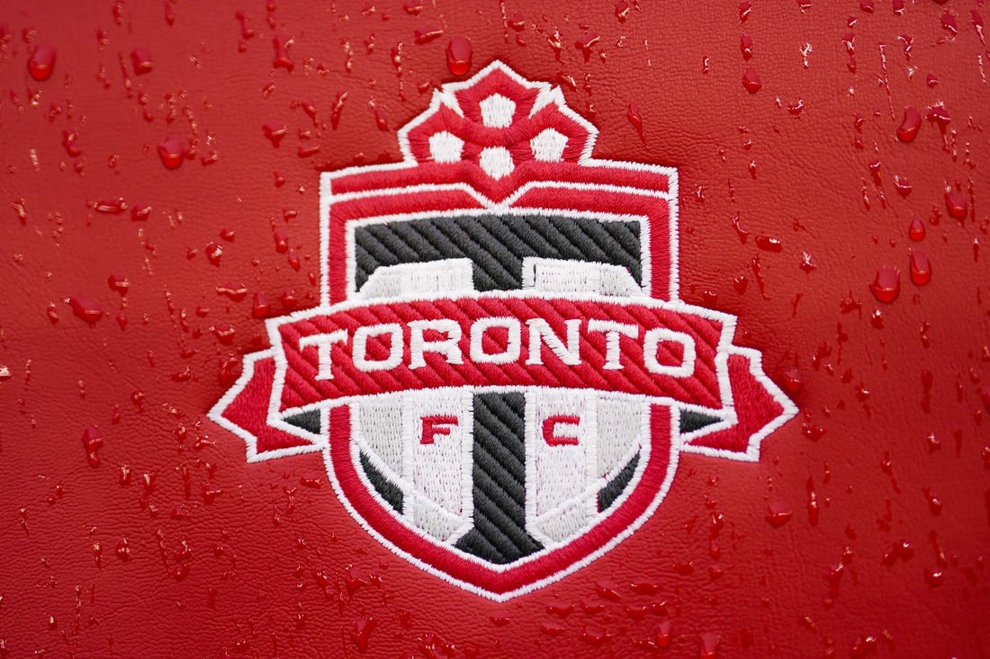 Mar 19, 2022; Toronto, Ontario, CAN;  Toronto FC logo on seat is covered in rain before an MLS game between D.C. United and Toronto FC at BMO Field. Mandatory Credit: Kevin Sousa-USA TODAY Sports