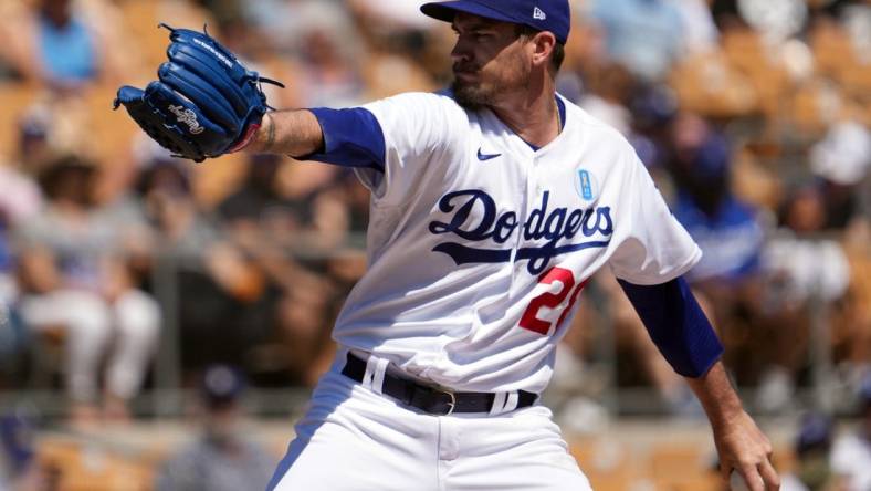 Mar 27, 2022; Phoenix, Arizona, USA; Los Angeles Dodgers starting pitcher Andrew Heaney (28) pitches against the Chicago White Sox during the first inning of a spring training game at Camelback Ranch-Glendale. Mandatory Credit: Joe Camporeale-USA TODAY Sports