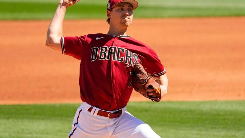 Mar 31, 2022; Scottsdale, Arizona, USA; Arizona Diamondbacks pitcher Luke Weaver warms-up against the San Diego Padres in the second inning during a spring training game at Salt River Fields. Mandatory Credit: Rob Schumacher-Arizona Republic

Mlb San Diego Padres At Arizona Diamondbacks