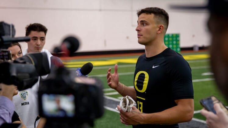 Devon Allen talks to reporters during Oregon Football   s Pro Day Friday, April 1, 2022, at the Moshofsky Center in Eugene Ore.