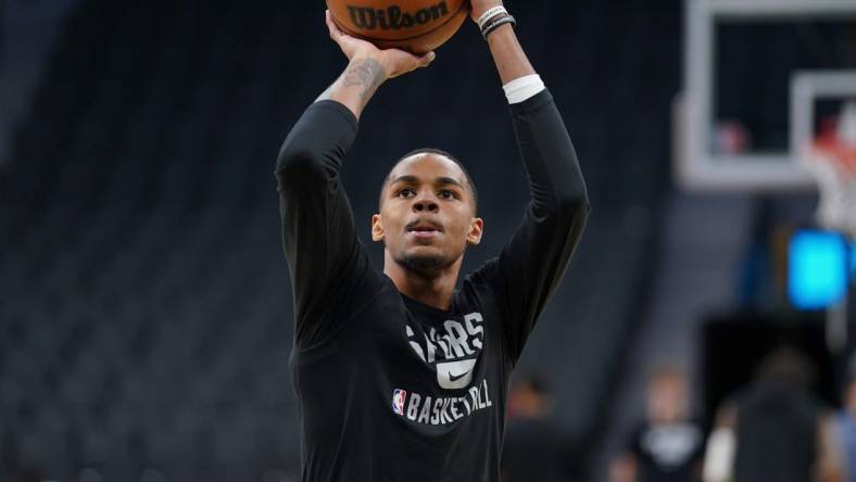 Apr 3, 2022; San Antonio, Texas, USA; San Antonio Spurs guard Dejounte Murray (5) warms up before the game against the Portland Trail Blazers at the AT&T Center. Mandatory Credit: Daniel Dunn-USA TODAY Sports