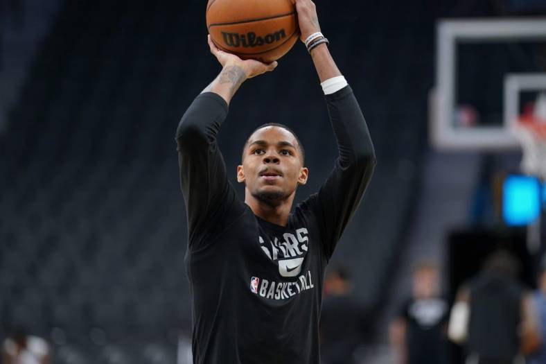Apr 3, 2022; San Antonio, Texas, USA; San Antonio Spurs guard Dejounte Murray (5) warms up before the game against the Portland Trail Blazers at the AT&T Center. Mandatory Credit: Daniel Dunn-USA TODAY Sports