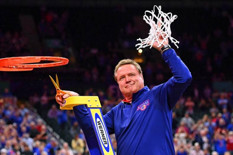 Apr 4, 2022; New Orleans, LA, USA; Kansas Jayhawks head coach Bill Self reacts after cutting down the net after their win against the North Carolina Tar Heels in the 2022 NCAA men's basketball tournament Final Four championship game at Caesars Superdome. Mandatory Credit: Bob Donnan-USA TODAY Sports