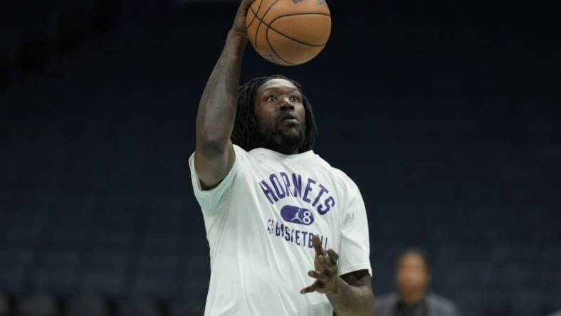 Apr 7, 2022; Charlotte, North Carolina, USA; Charlotte Hornets center Montrezl Harrell (8) during pregame warm ups against the Orlando Magic at Spectrum Center. Mandatory Credit: Jim Dedmon-USA TODAY Sports