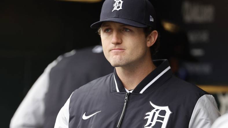 Apr 9, 2022; Detroit, Michigan, USA;  Detroit Tigers starting pitcher Casey Mize (12) watches from the dugout in the fifth inning against the Chicago White Sox at Comerica Park. Mandatory Credit: Rick Osentoski-USA TODAY Sports