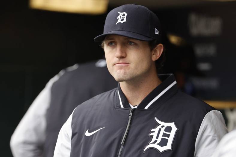 Apr 9, 2022; Detroit, Michigan, USA;  Detroit Tigers starting pitcher Casey Mize (12) watches from the dugout in the fifth inning against the Chicago White Sox at Comerica Park. Mandatory Credit: Rick Osentoski-USA TODAY Sports