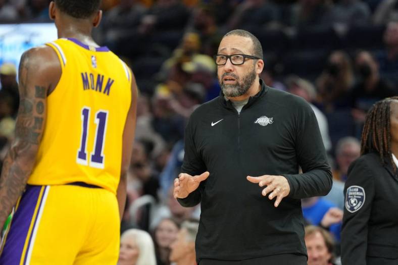 Apr 7, 2022; San Francisco, California, USA; Los Angeles Lakers assistant coach David Fizdale talks to guard Malik Monk (11) during the fourth quarter against the Golden State Warriors at Chase Center. Mandatory Credit: Darren Yamashita-USA TODAY Sports