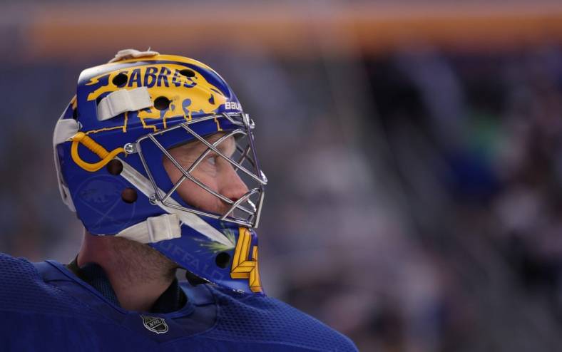 Apr 14, 2022; Buffalo, New York, USA;  Buffalo Sabres goaltender Craig Anderson (41) during a stoppage in play in the first period against the St. Louis Blues at KeyBank Center. Mandatory Credit: Timothy T. Ludwig-USA TODAY Sports
