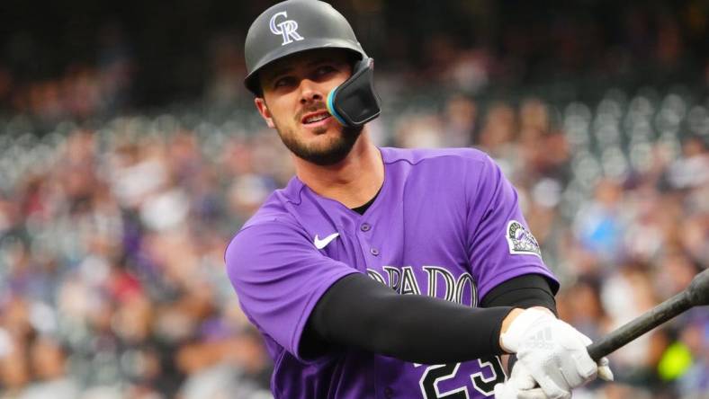 Apr 19, 2022; Denver, Colorado, USA; Colorado Rockies left fielder Kris Bryant (23) on deck in the first inning against the Philadelphia Phillies at Coors Field. Mandatory Credit: Ron Chenoy-USA TODAY Sports