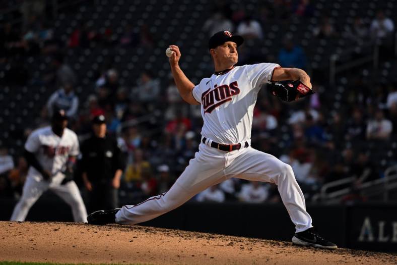 Apr 23, 2022; Minneapolis, Minnesota, USA;  Minnesota Twins relief pitcher Cody Stashak (61) delivers a pitch against the Chicago White Sox during the sixth inning at Target Field. Mandatory Credit: Nick Wosika-USA TODAY Sports