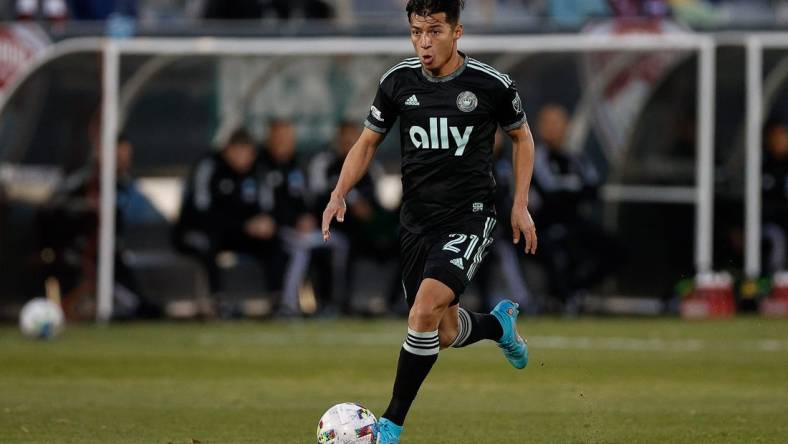 Apr 23, 2022; Commerce City, Colorado, USA; Charlotte FC midfielder Alan Franco (21) controls the ball in the first half against the Colorado Rapids at Dick's Sporting Goods Park. Mandatory Credit: Isaiah J. Downing-USA TODAY Sports