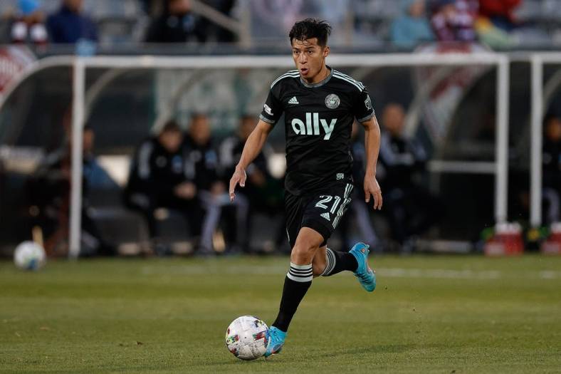Apr 23, 2022; Commerce City, Colorado, USA; Charlotte FC midfielder Alan Franco (21) controls the ball in the first half against the Colorado Rapids at Dick's Sporting Goods Park. Mandatory Credit: Isaiah J. Downing-USA TODAY Sports