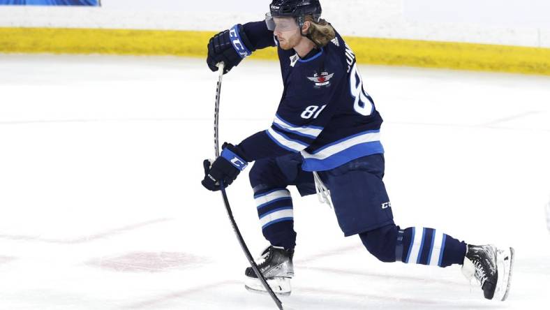 Apr 24, 2022; Winnipeg, Manitoba, CAN; Winnipeg Jets left wing Kyle Connor (81) warms up before a game against the Colorado Avalanche at Canada Life Centre. Mandatory Credit: James Carey Lauder-USA TODAY Sports