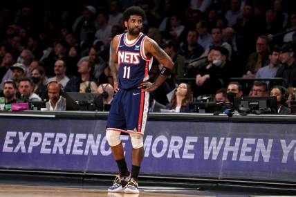 Apr 25, 2022; Brooklyn, New York, USA; Brooklyn Nets guard Kyrie Irving (11) reacts during the second quarter of game four of the first round of the 2022 NBA playoffs against the Boston Celtics at Barclays Center. Mandatory Credit: Brad Penner-USA TODAY Sports