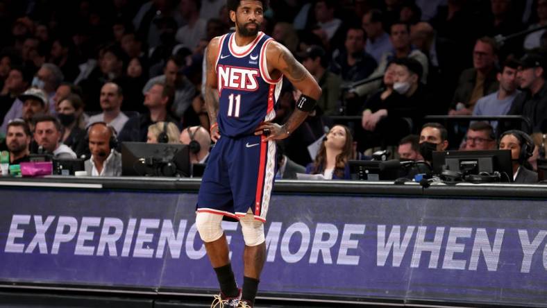 Apr 25, 2022; Brooklyn, New York, USA; Brooklyn Nets guard Kyrie Irving (11) reacts during the second quarter of game four of the first round of the 2022 NBA playoffs against the Boston Celtics at Barclays Center. Mandatory Credit: Brad Penner-USA TODAY Sports