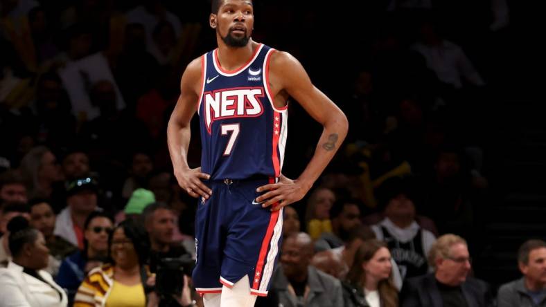 Apr 25, 2022; Brooklyn, New York, USA; Brooklyn Nets forward Kevin Durant (7) reacts during the second quarter of game four of the first round of the 2022 NBA playoffs against the Boston Celtics at Barclays Center. Mandatory Credit: Brad Penner-USA TODAY Sports